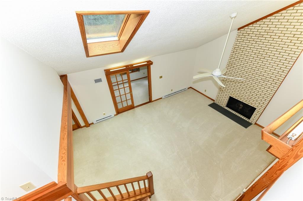 7205 Haw Ridge Road Summerfield, NC 27358 - Photo 19 of 50 View of great room from 2nd floor