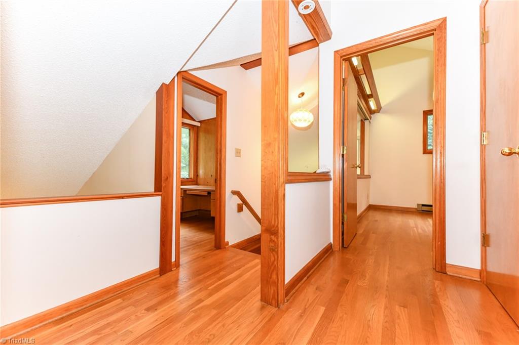 7205 Haw Ridge Road Summerfield, NC 27358 - Photo 21 of 50 2nd floor landing at top of stairs