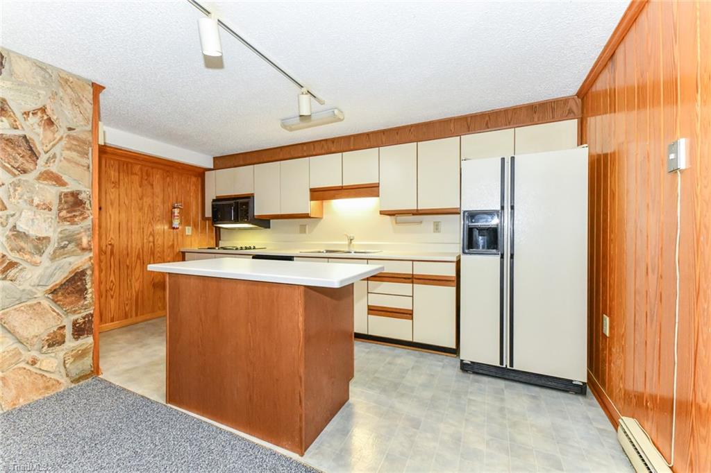 7205 Haw Ridge Road Summerfield, NC 27358 - Photo 28 of 50 Basement kitchen