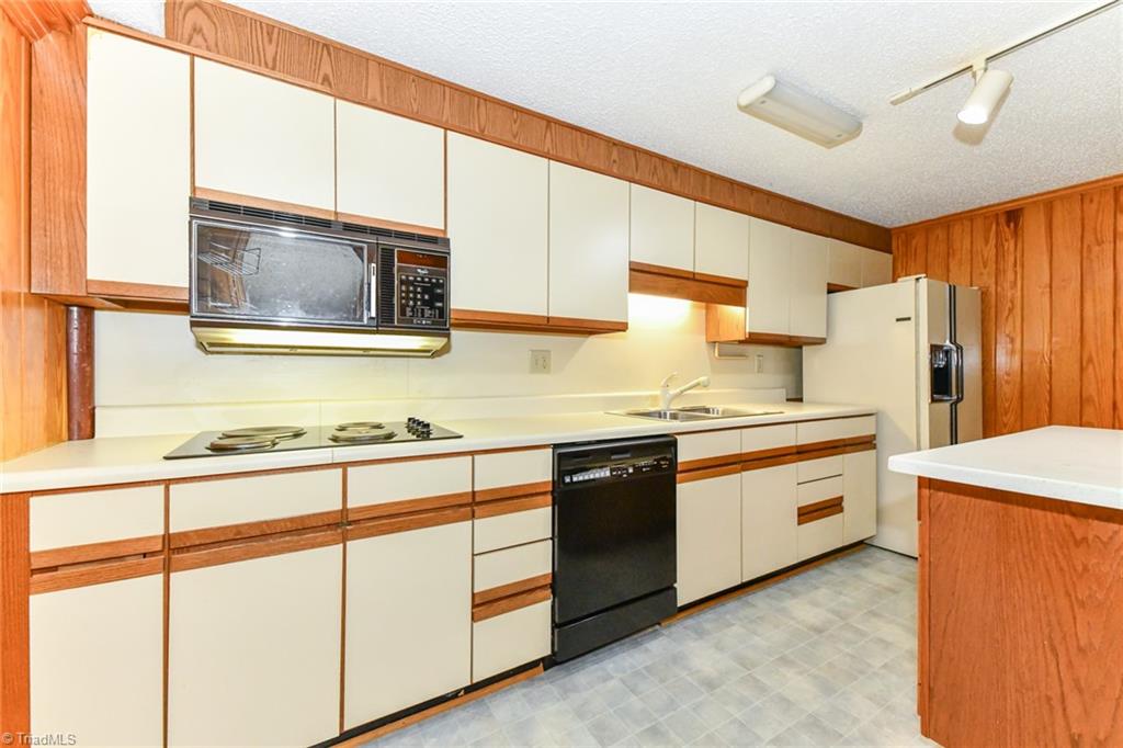 7205 Haw Ridge Road Summerfield, NC 27358 - Photo 29 of 50 Basement kitchen