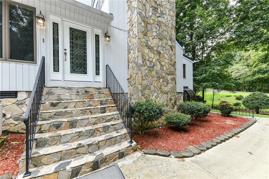 7205 Haw Ridge Road Summerfield, NC 27358 - Photo 5 of 50 Side/main entrance to home