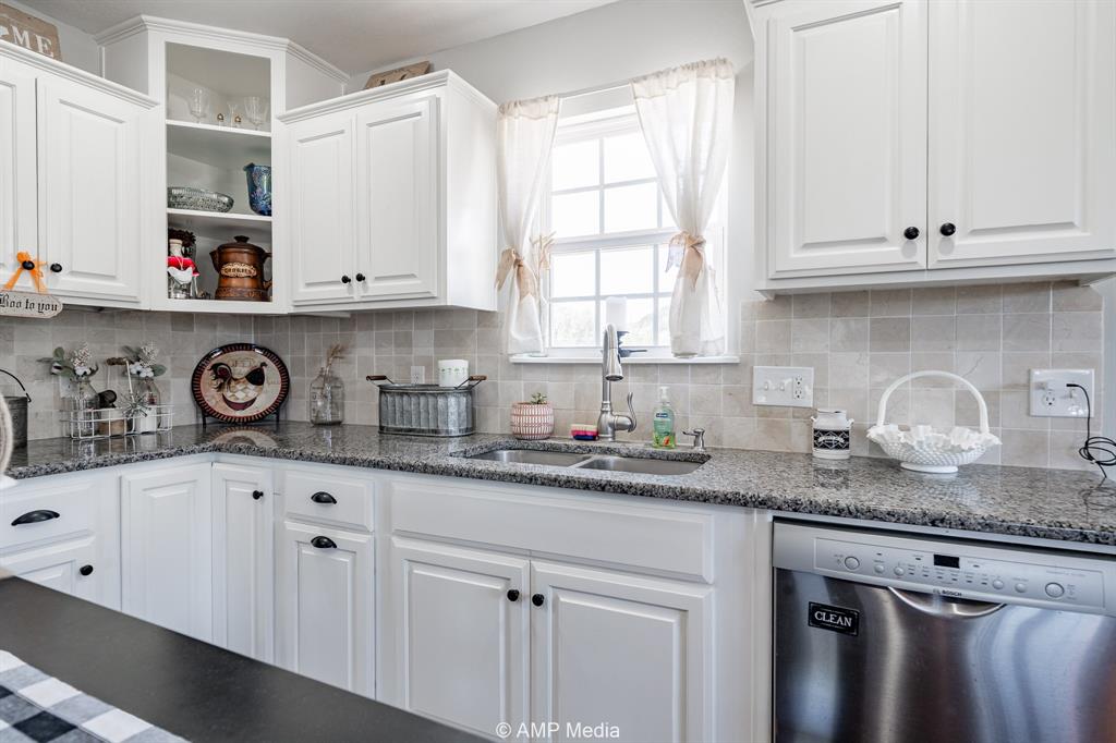 1002 County Road 209 Wingate, TX 79566 - Photo 11 of 23 Kitchen with Granite Countertops