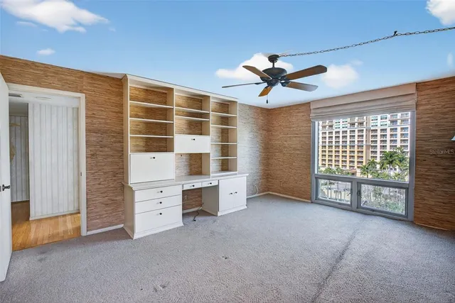 a view of workspace with furniture and natural light