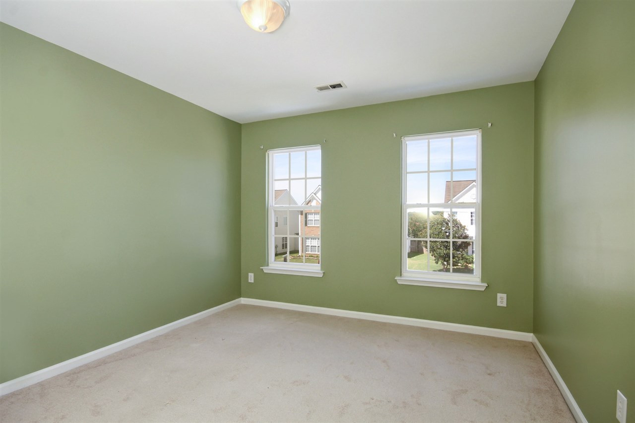 7444 Lagrange Drive Raleigh, NC 27613 - Photo 22 of 30 All of the bedrooms have new paint , large closets and carpet with great closet space. Bedroom 3