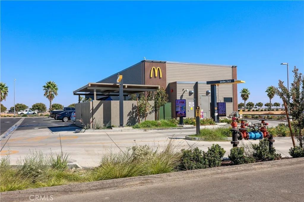 0 Vassar Merced, CA 95341 - Photo 11 of 20 a front view of a house with a yard