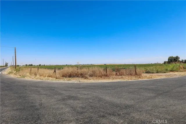 a view of a road with an ocean view