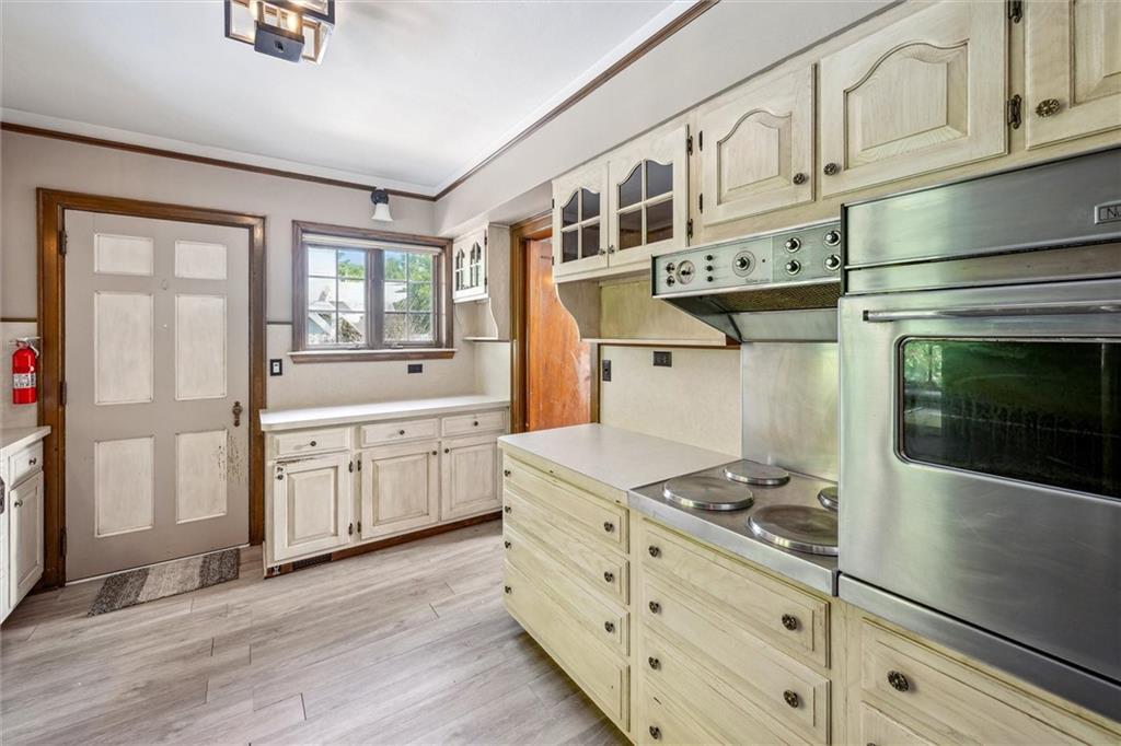 705 Chestnut Street Emlenton, PA 16373 - Photo 14 of 48 a kitchen with stainless steel appliances granite countertop a stove and a sink