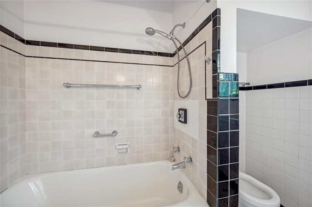 705 Chestnut Street Emlenton, PA 16373 - Photo 23 of 48 a bathroom with a shower and a bathtub