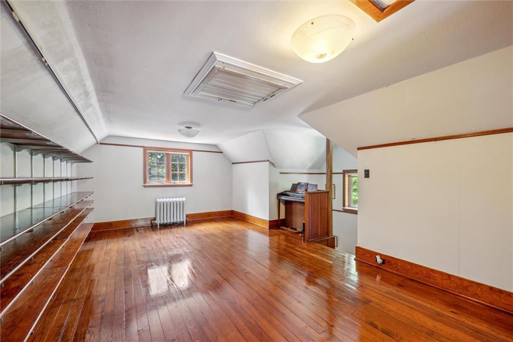 705 Chestnut Street Emlenton, PA 16373 - Photo 30 of 48 a view of a livingroom with wooden floor and a ceiling fan