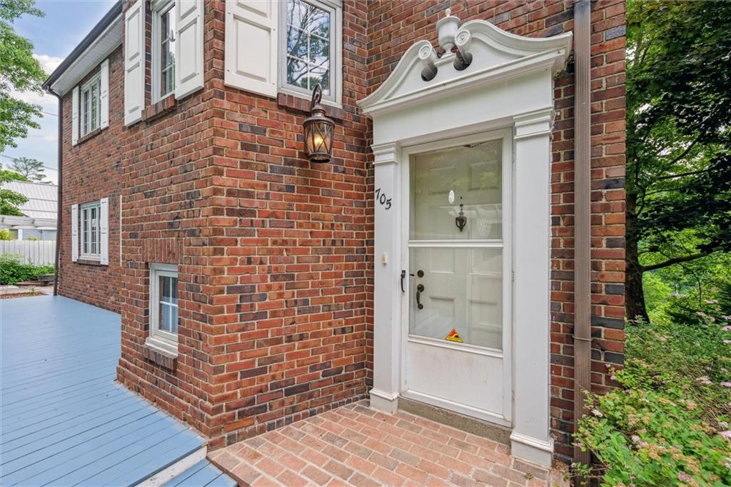705 Chestnut Street Emlenton, PA 16373 - Photo 3 of 48 a view of front door of house with wooden floor and a garden