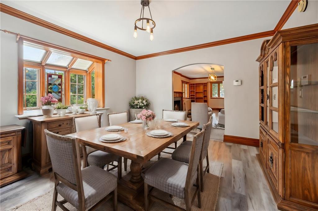 705 Chestnut Street Emlenton, PA 16373 - Photo 9 of 48 a view of a dining room with furniture window and wooden floor