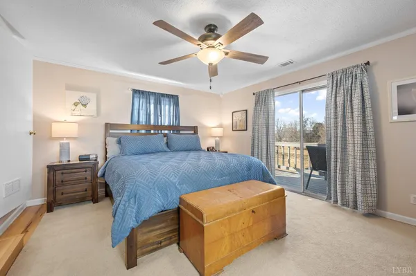 a bathroom with a sink a toilet and a window