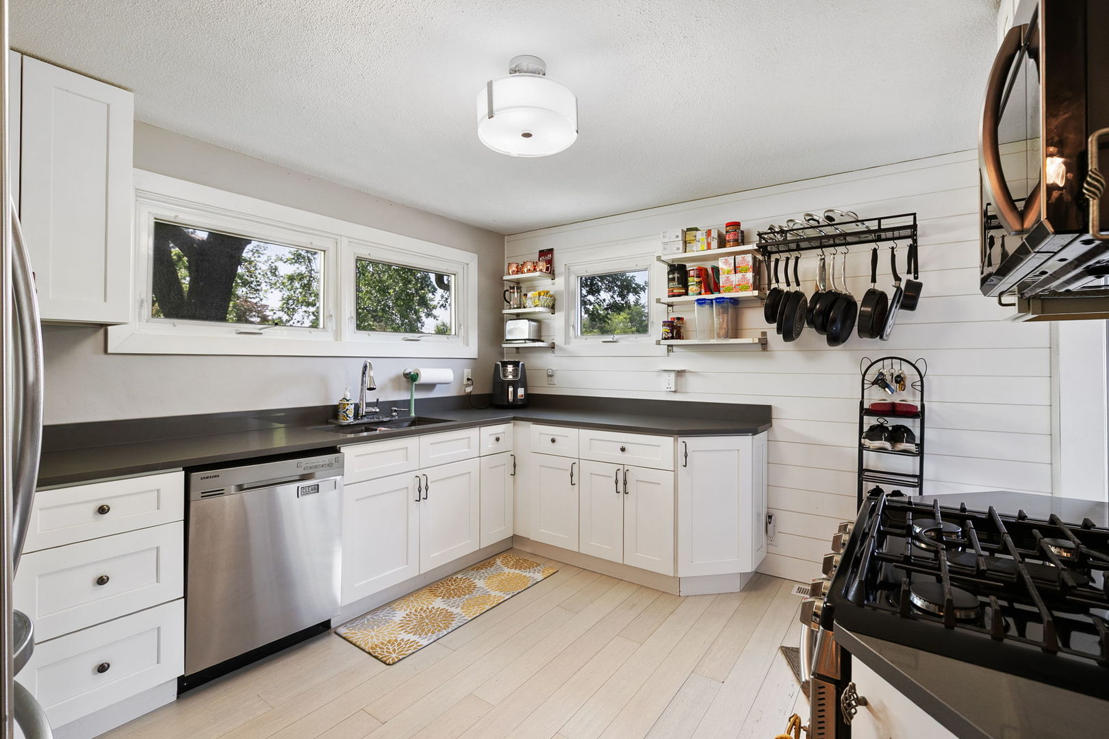 41W822 Burlington Road St. Charles, IL 60175 - Photo 8 of 26 a kitchen with a sink stove and cabinets
