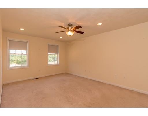 429 Ashby Road Ashburnham, MA 01430 - Photo 13 of 24 a view of a room with a ceiling fan and a window