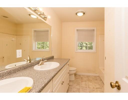 429 Ashby Road Ashburnham, MA 01430 - Photo 18 of 24 a bathroom with a granite countertop sink toilet and a mirror