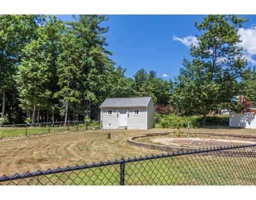 429 Ashby Road Ashburnham, MA 01430 - Photo 24 of 24 a front view of a house with a yard