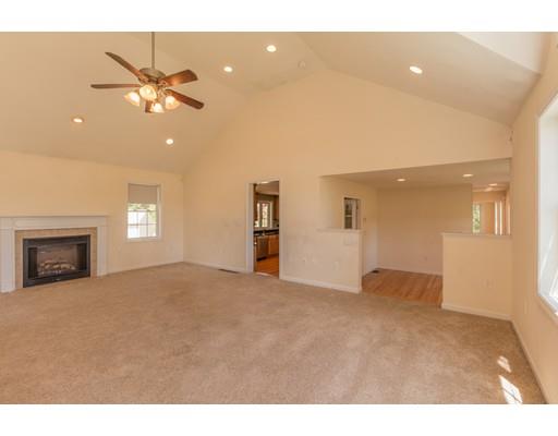 429 Ashby Road Ashburnham, MA 01430 - Photo 6 of 24 a view of an empty room with a ceiling fan