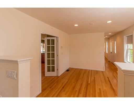 429 Ashby Road Ashburnham, MA 01430 - Photo 7 of 24 a view of empty room with wooden floor and fan