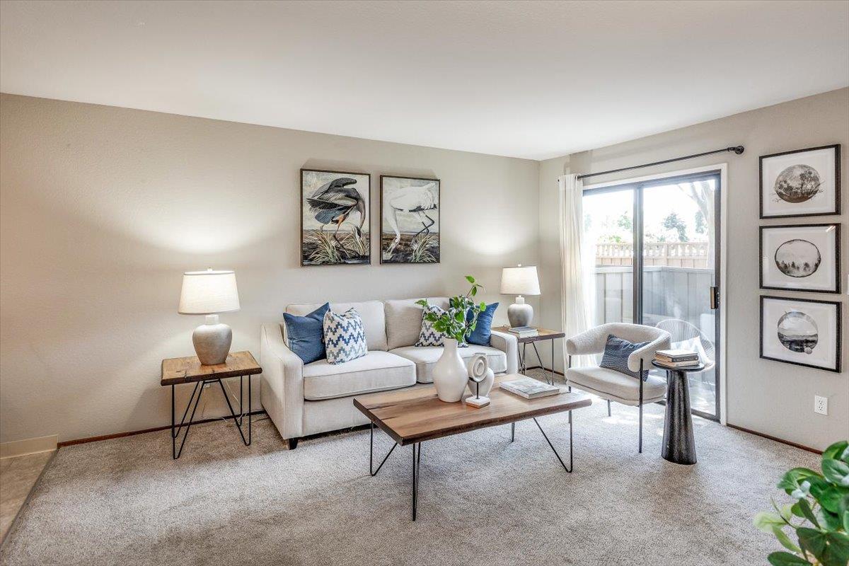18952 Sara Park Circle Saratoga, CA 95070 - Photo 1 of 21 a living room with furniture and a large window