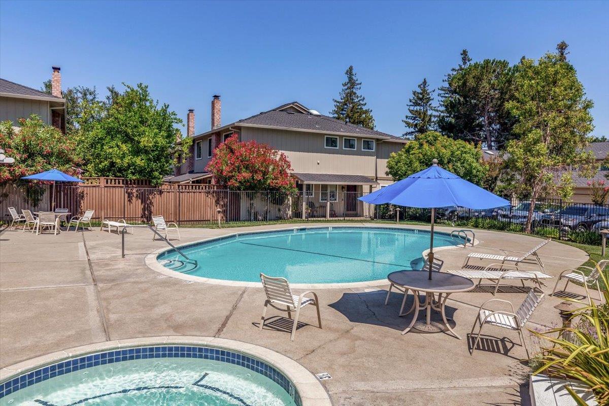 18952 Sara Park Circle Saratoga, CA 95070 - Photo 13 of 21 a view of pool with table and chairs under an umbrella
