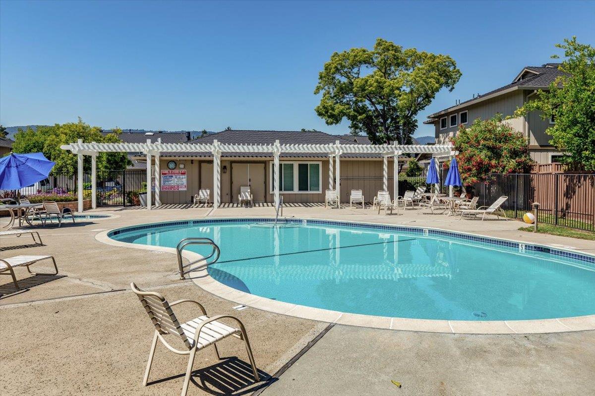 18952 Sara Park Circle Saratoga, CA 95070 - Photo 14 of 21 a view of a house with a swimming pool