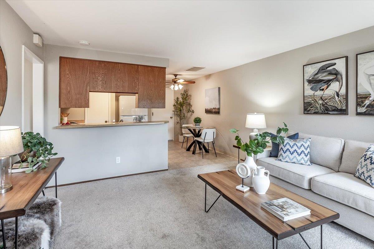 18952 Sara Park Circle Saratoga, CA 95070 - Photo 6 of 21 a living room with furniture and a large window