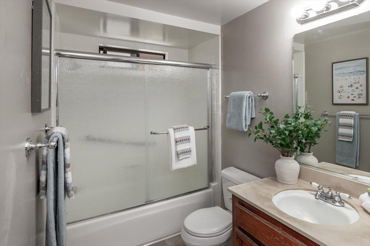 18952 Sara Park Circle Saratoga, CA 95070 - Photo 8 of 21 a bathroom with a sink toilet and shower