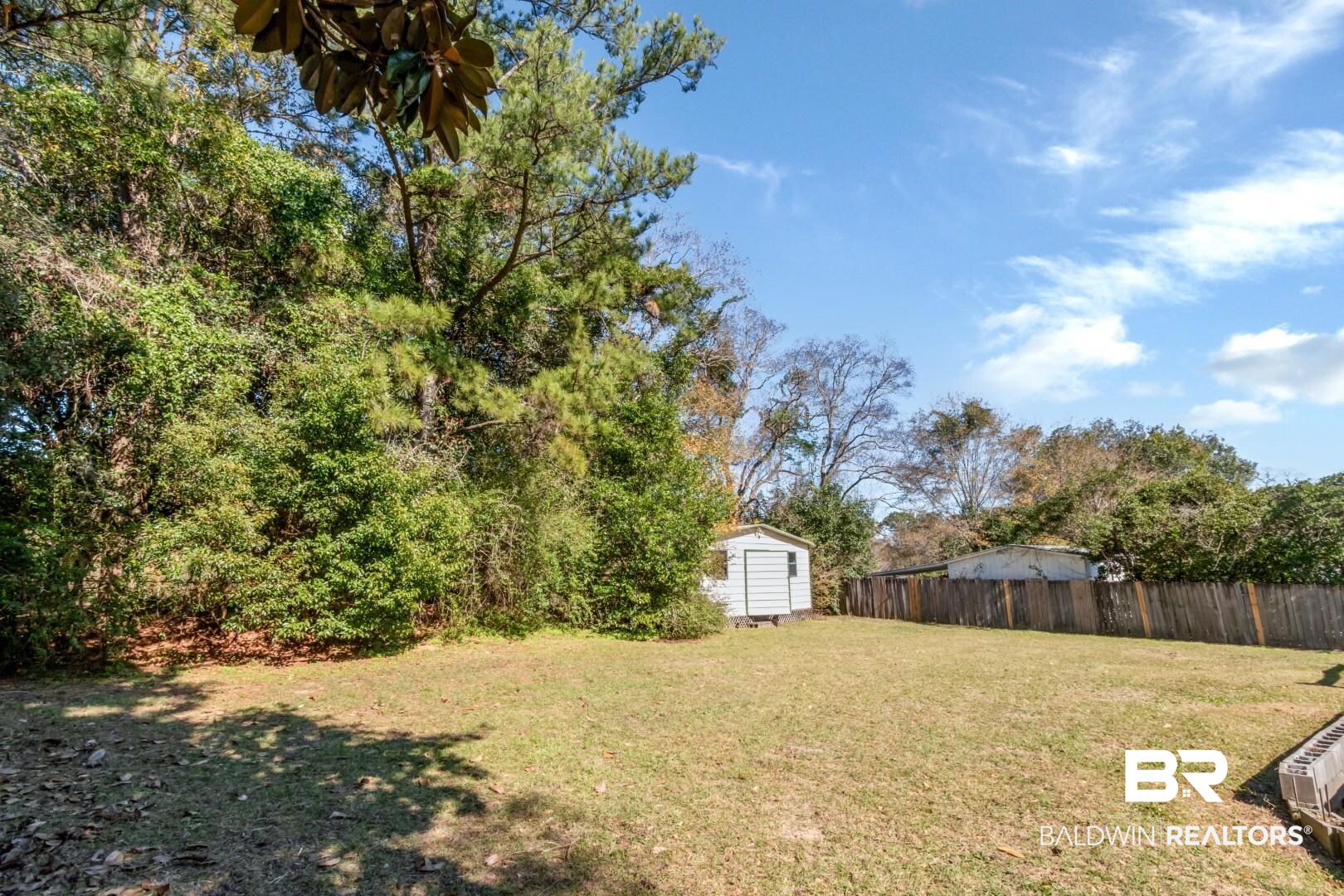 8304 Champlain Circle Mobile, AL 36695 - Photo 37 of 46 View of yard with a shed