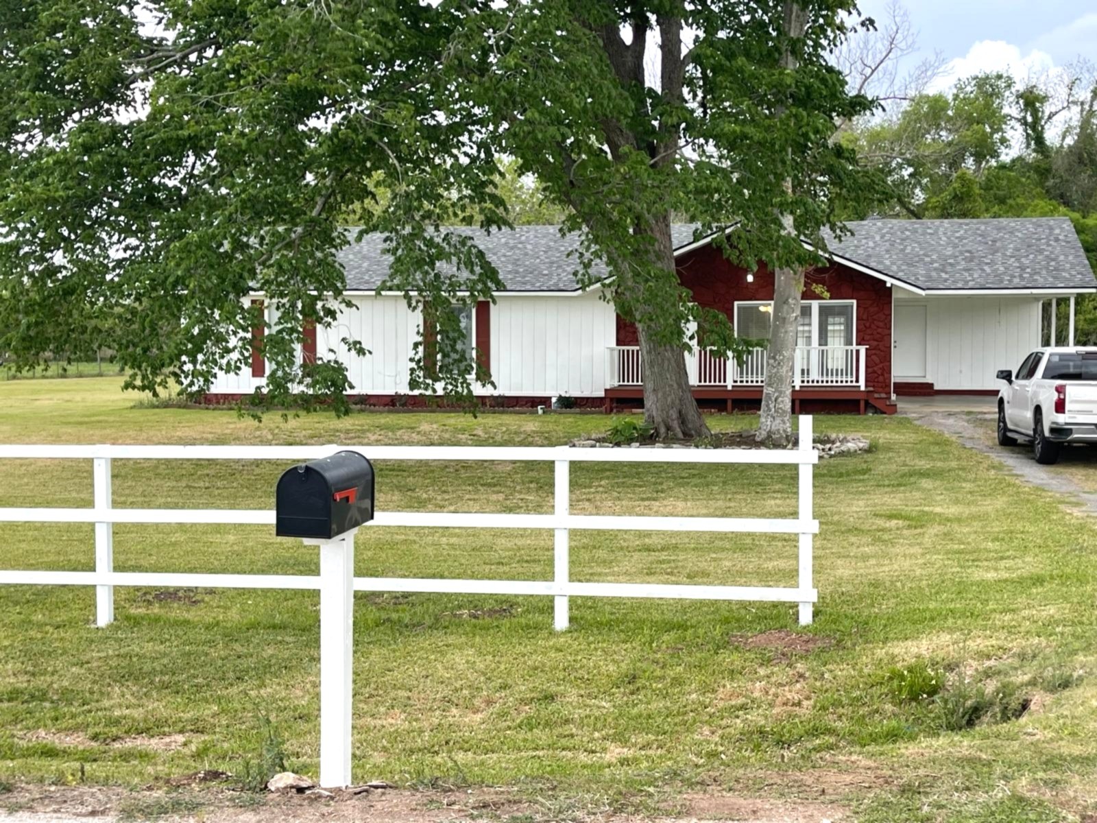 335 Carroll Road Richmond, TX 77469 - Photo 1 of 25 a house with a yard in front of it