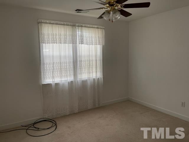 4320 Major Loring Way Raleigh, NC 27616 - Photo 17 of 37 a view of an empty room with a window