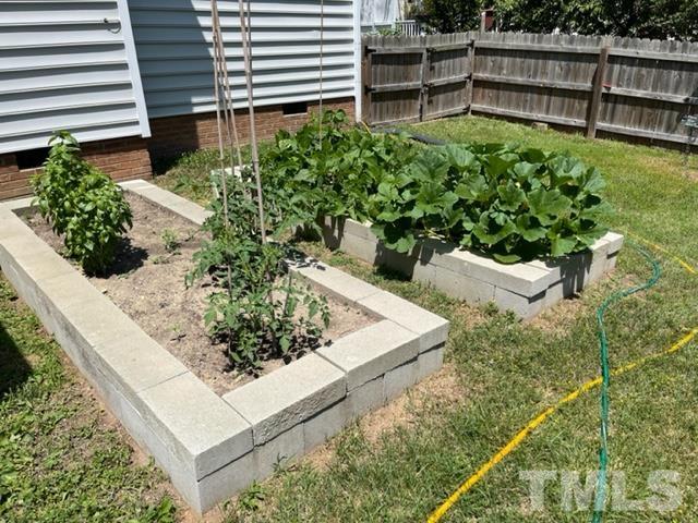 4320 Major Loring Way Raleigh, NC 27616 - Photo 18 of 37 a view of a garden with outdoor seating