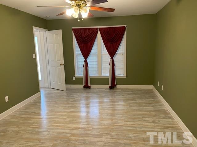 4320 Major Loring Way Raleigh, NC 27616 - Photo 27 of 37 a view of empty room with wooden floor