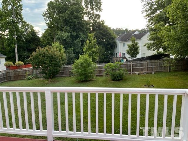 4320 Major Loring Way Raleigh, NC 27616 - Photo 36 of 37 a balcony view with a garden