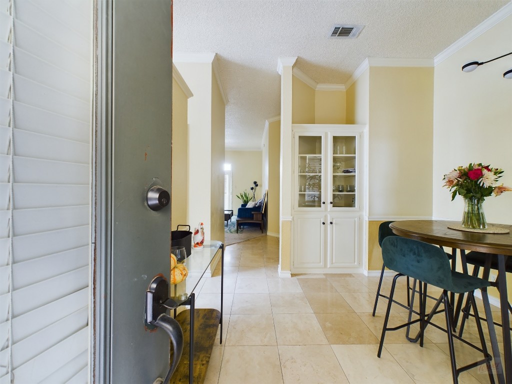 a view of a workspace room with furniture and wooden floor