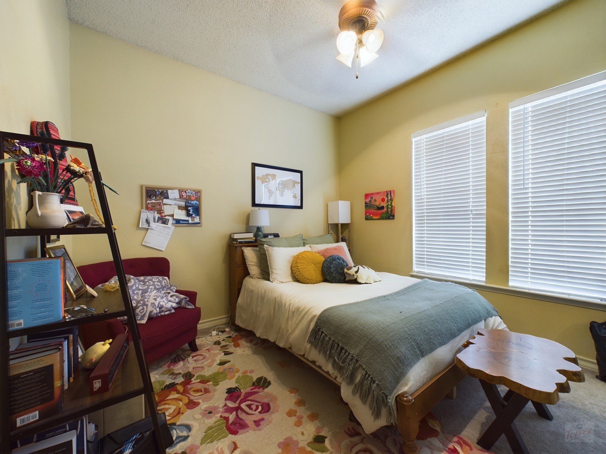 914 West 26th Street, Unit 303 Austin, TX 78705 - Photo 15 of 30 a bedroom with a bed and wooden floor