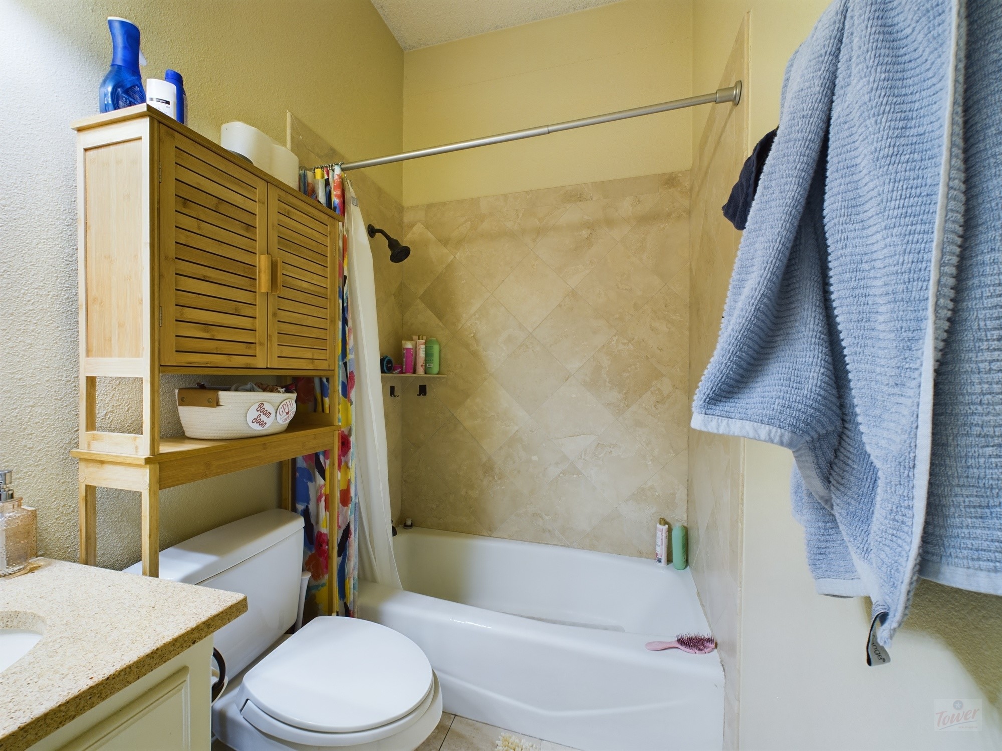 914 West 26th Street, Unit 303 Austin, TX 78705 - Photo 19 of 30 a bathroom with a sink toilet and shower