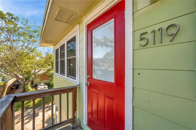 a view of a door and a street