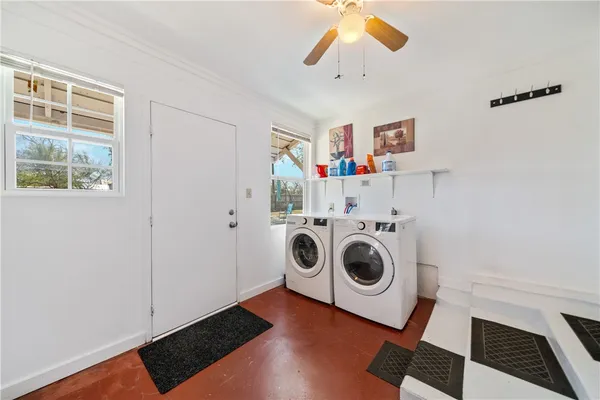 a utility room with dryer and washer