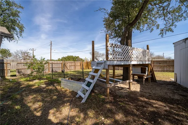 a view of a terrace with chairs