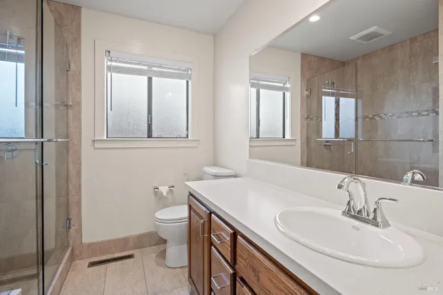 a bathroom with a sink and a toilet