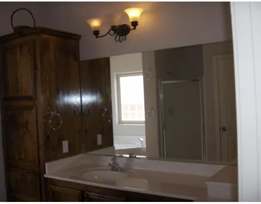 a view of a livingroom with a refrigerator