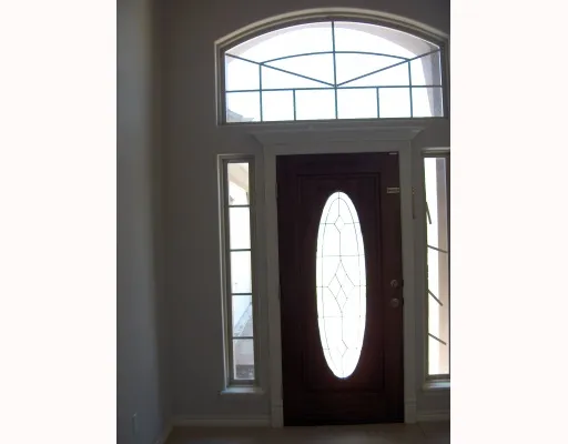 a view of a entryway with wooden floor