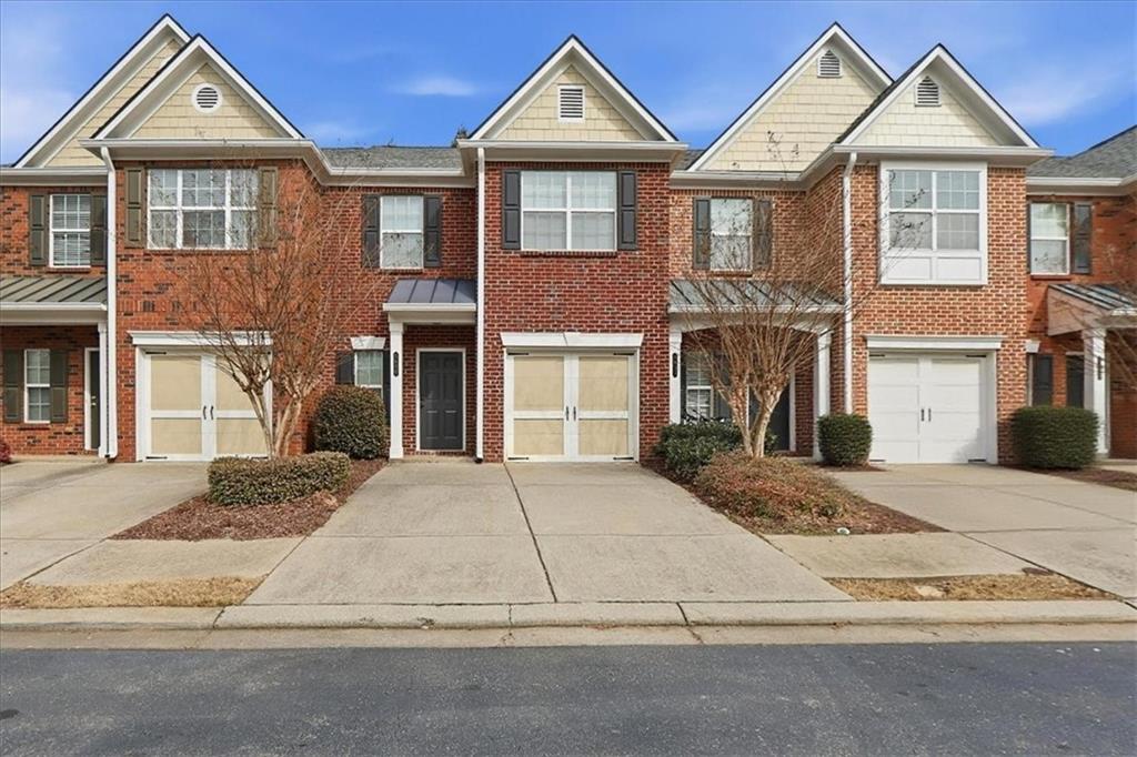 5630 Lawley Road Alpharetta, GA 30022 - Photo 2 of 65 a front view of a house