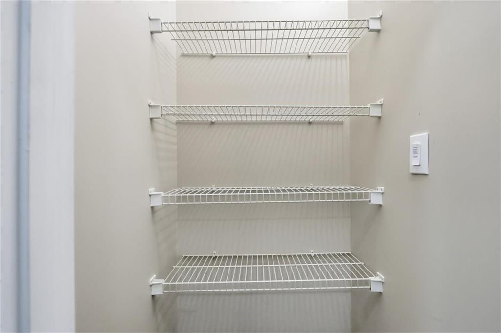 5630 Lawley Road Alpharetta, GA 30022 - Photo 25 of 65 a bathroom with a window