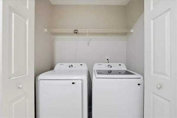 a bathroom with a shower and toilet