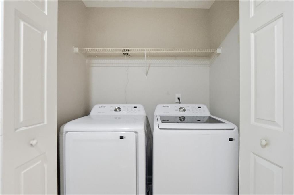 5630 Lawley Road Alpharetta, GA 30022 - Photo 28 of 65 a utility room with dryer and washer