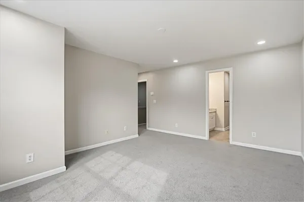 a front view of a house with a large window