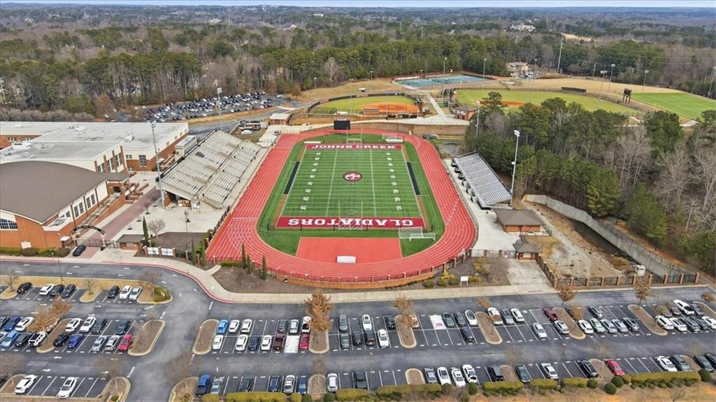 5630 Lawley Road Alpharetta, GA 30022 - Photo 58 of 65 a view of swimming pool with a yard
