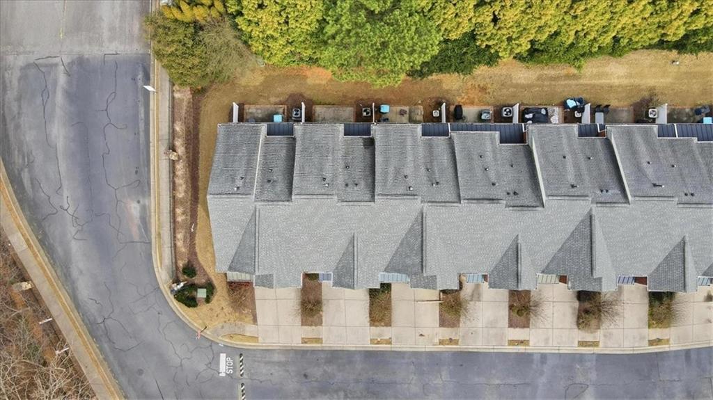 5630 Lawley Road Alpharetta, GA 30022 - Photo 62 of 65 an aerial view of residential houses with outdoor space
