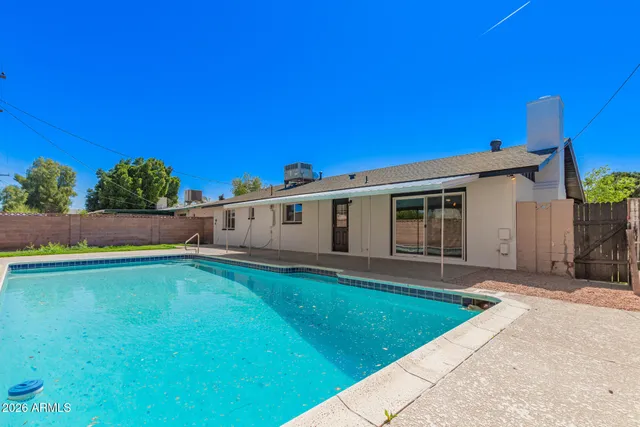 a front view of a house with yard